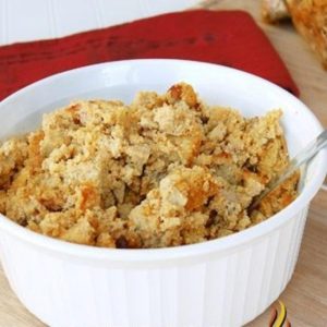 moist cornbread stuffing in white serving dish