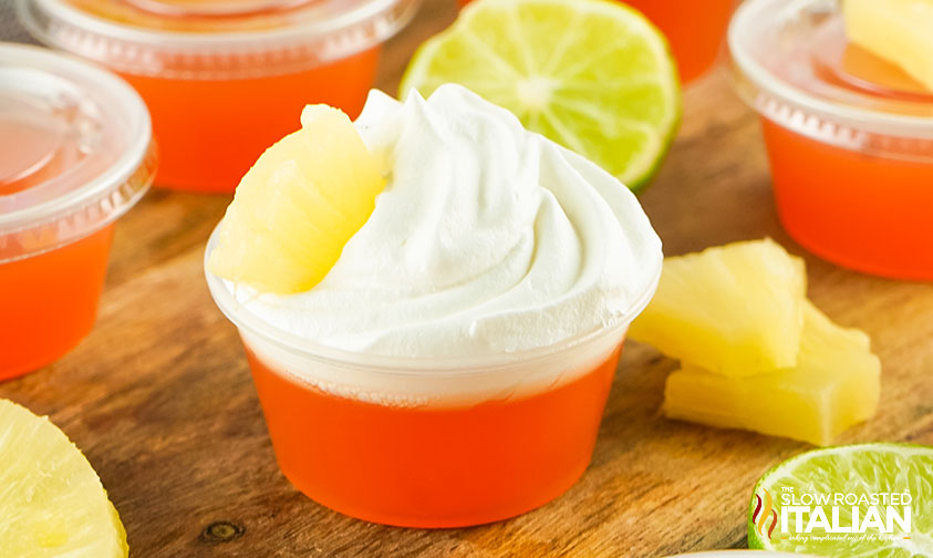 bahama mama jello shot with whipped cream and pineapple