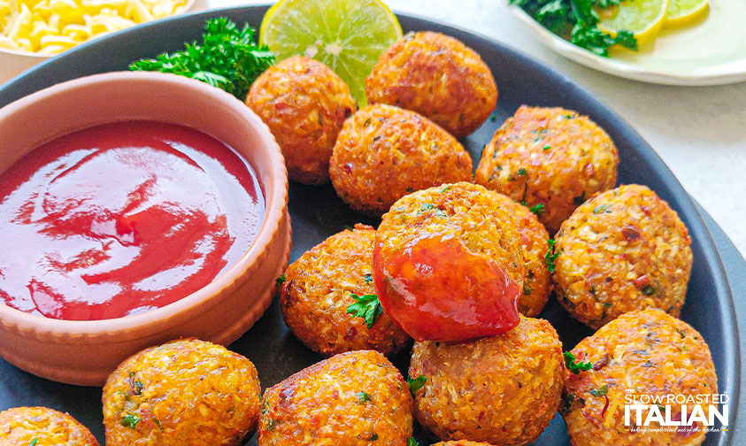 cheesy cauliflower bites dipped in marinara