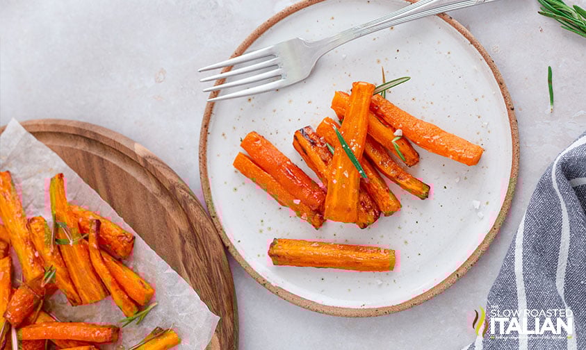 plate of air fryer honey glazed carrots with a fork