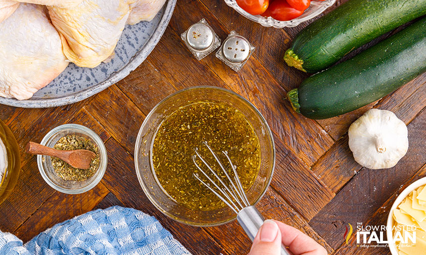 whisking olive oil and seasoning