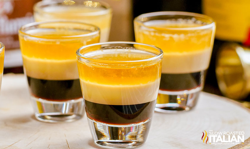 layered b52 drink in 4 shot glasses
