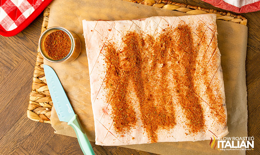 pork belly scored with sweet bbq rub