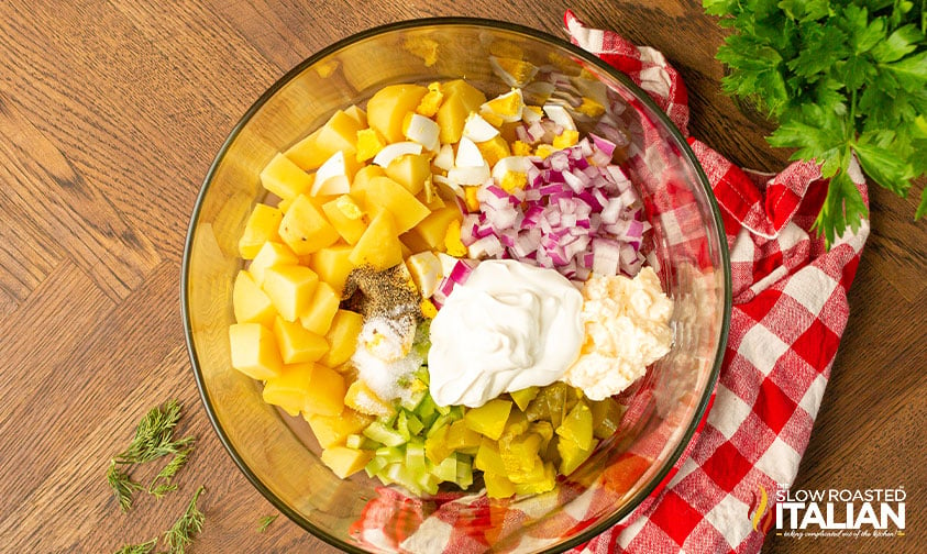 ingredients for smoked potato salad in glass bowl