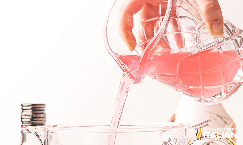 pouring pink whitney into pitcher