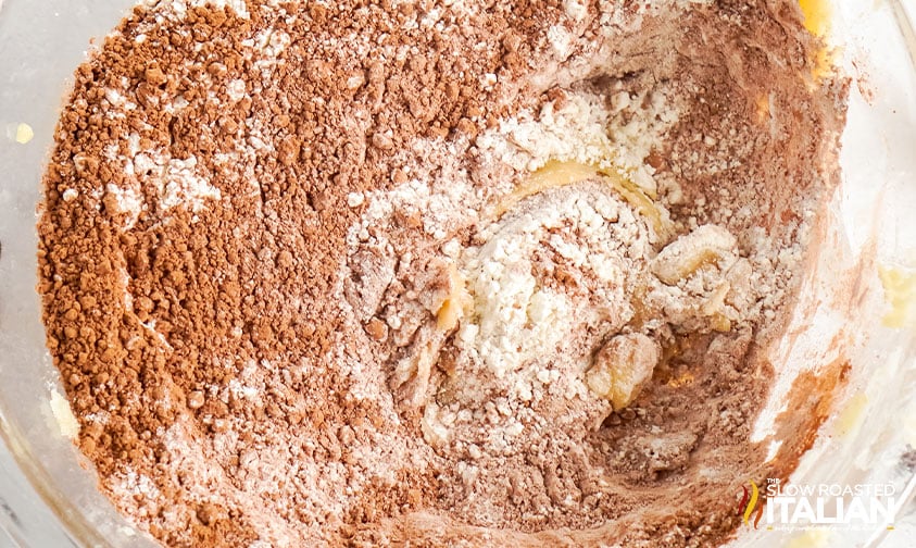 mixing dough for triple chocolate chip cookies