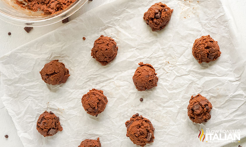triple chocolate cookie dough scooped on baking sheet