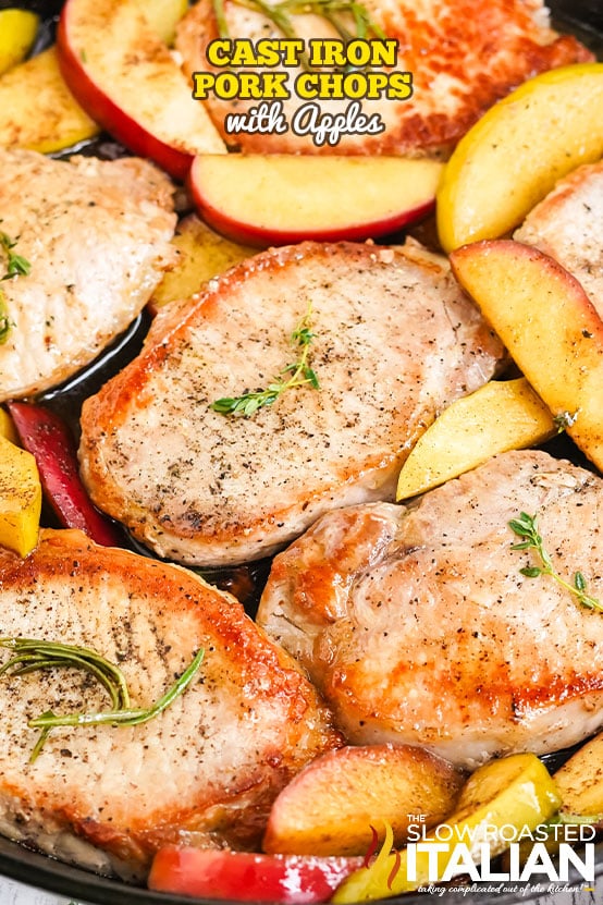 cast iron pork chops with apple slices.