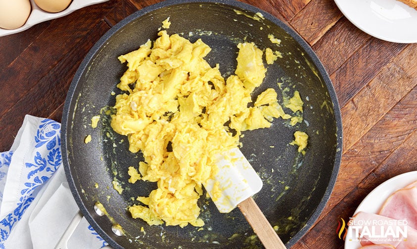 scrambled eggs in skillet.