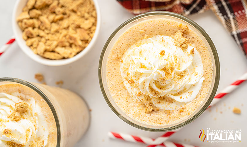 top view of pumpkin milkshake in glass.