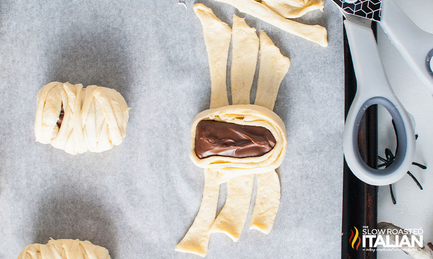 crescent dough with snickers in the middle.