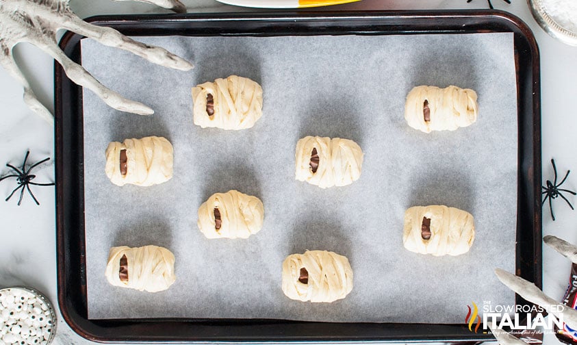 stuffed crescent rolls on baking sheet.
