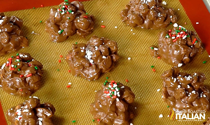 crockpot Christmas candy scoops on baking sheet