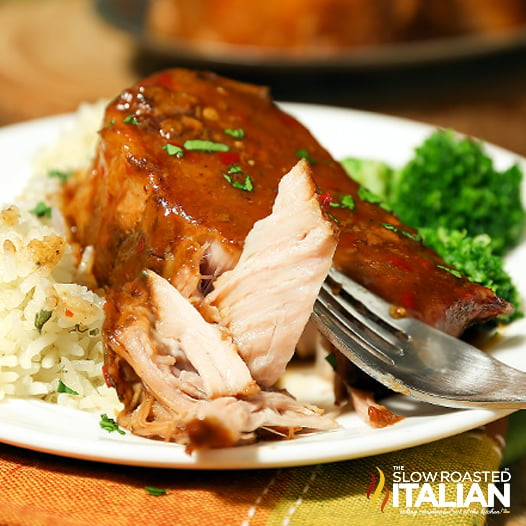 tender crockpot pork chops on a plate.