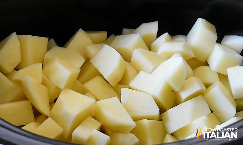 cubed potatoes in crockpot.