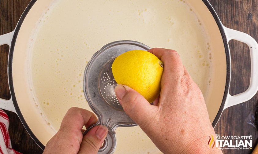 adding fresh lime juice to dutch oven.