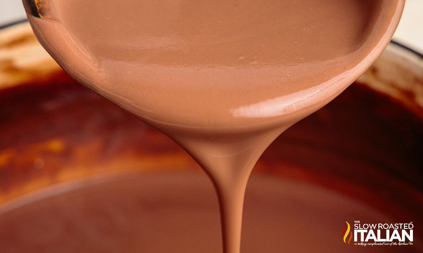 pouring thick hot chocolate.