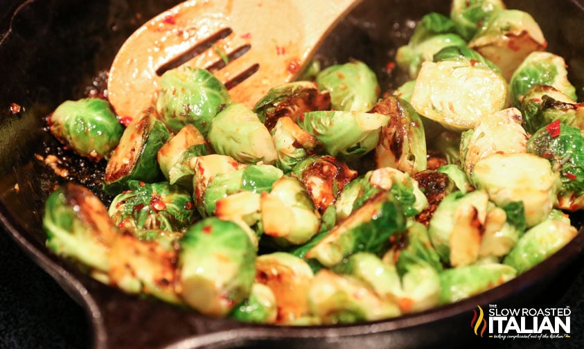 healthy pan fried vegetables in cast iron skillet.