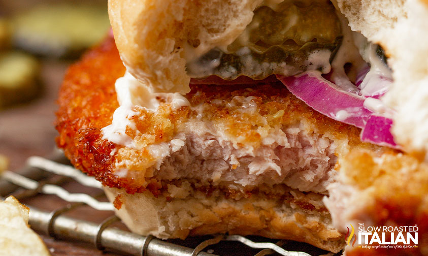 bite out of Iowa pork tenderloin sandwich.