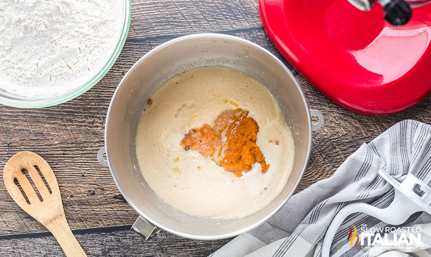 mixing dough for pumpkin dinner rolls
