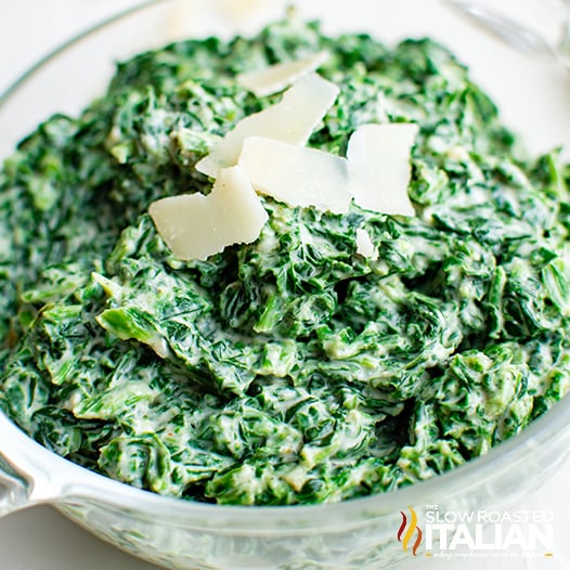 creamed spinach in glass bowl.
