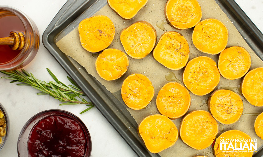 sweet potato rounds on baking sheet.