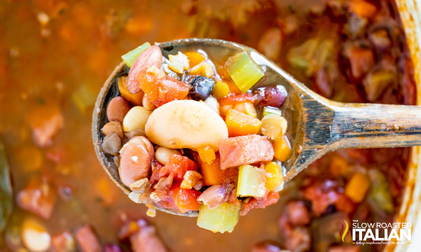 bean soup in wooden spoon.
