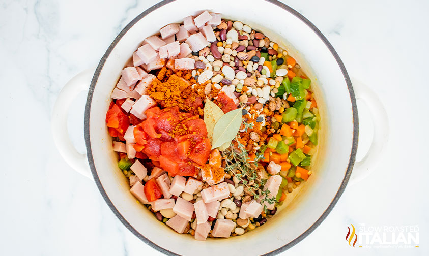 ingredients for bean soup in pot.