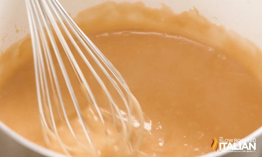 whisking brown gravy