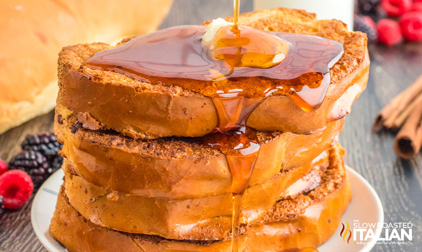 stack of french toast with syrup.
