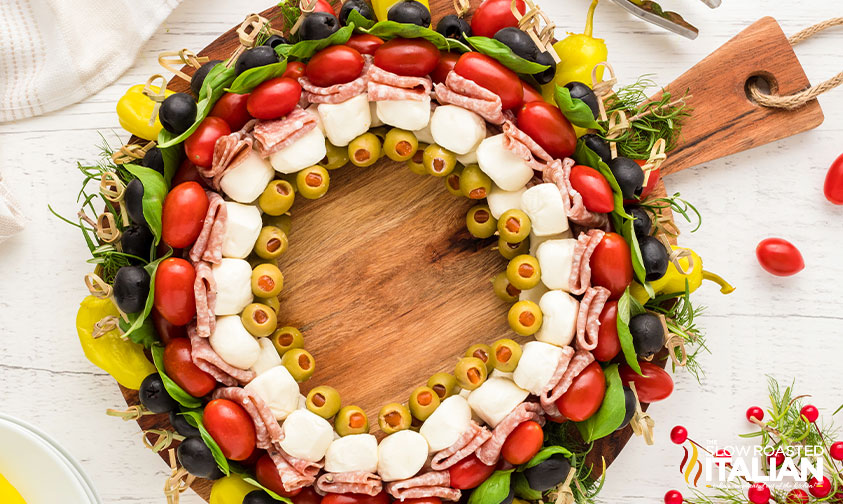 antipasto wreath on wooden board