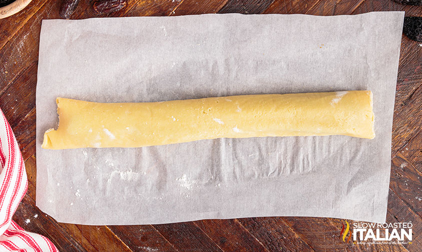 roll of cuccidati cookies.