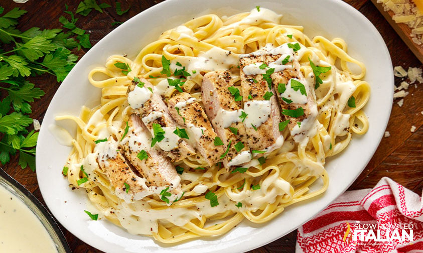 plate of fettucine and chicken alfredo