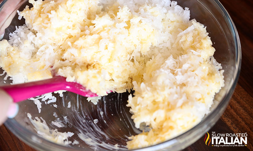 mixing coconut macaroon ingredients