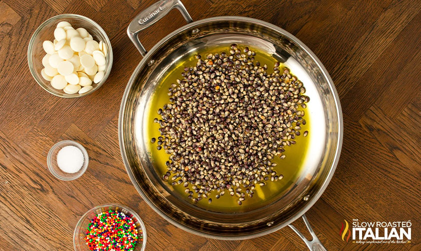 popcorn kernels in skillet.