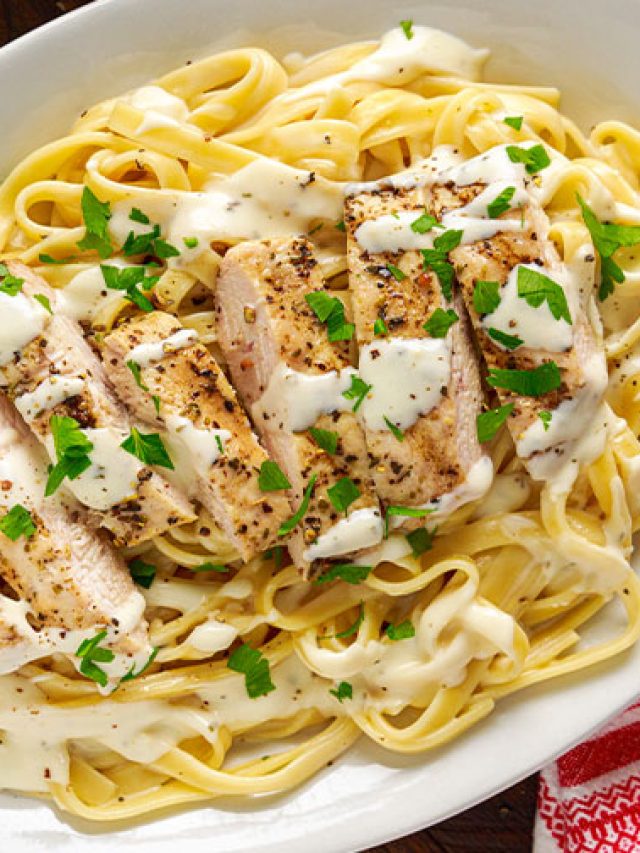 plate of fettucine and chicken alfredo