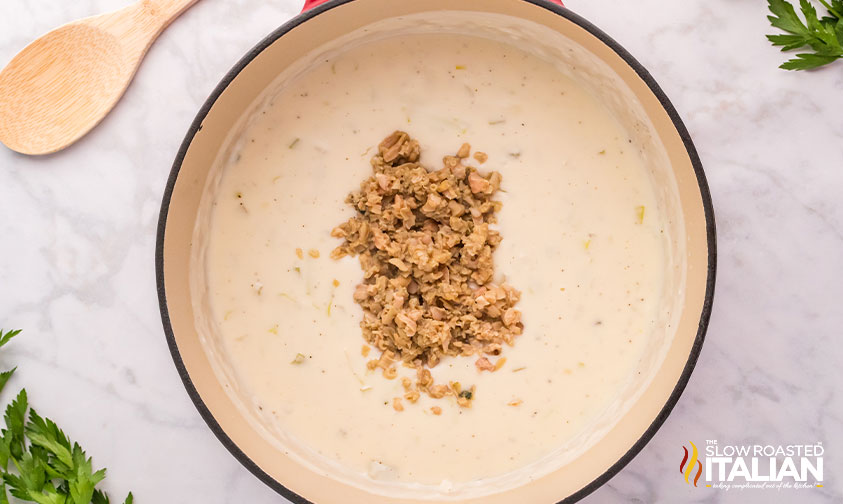 clam chowder is in a pan