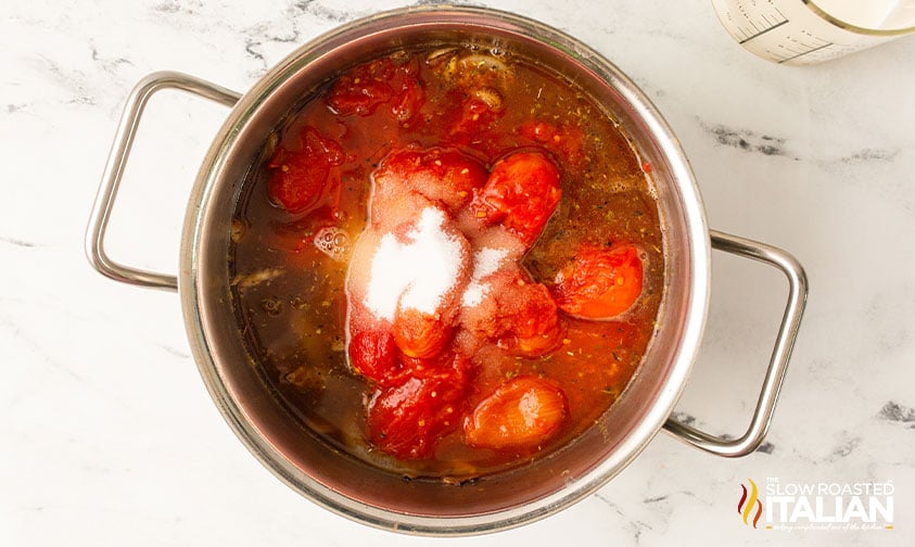 tomatoes in a pot.