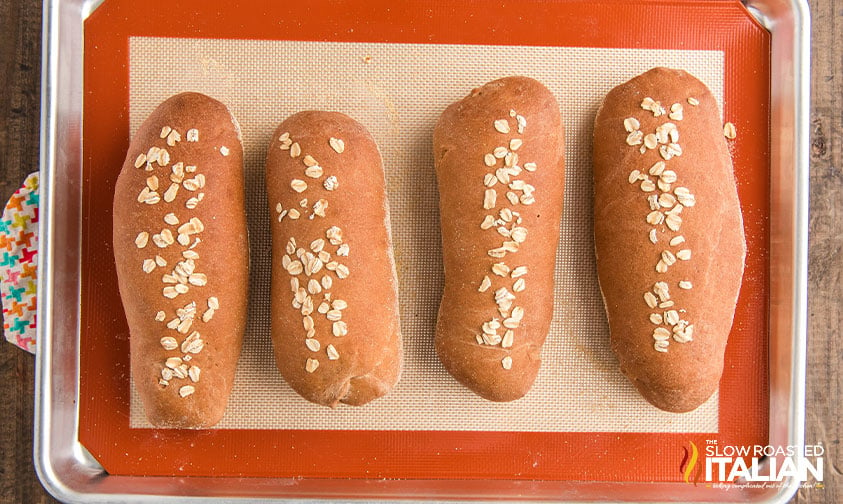 loaves of Cheesecake Factory bread on a silpat lined baking sheet