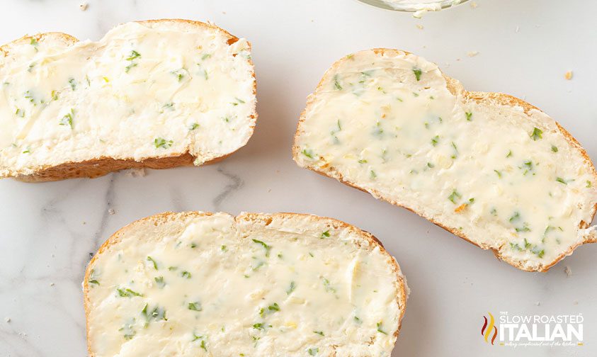 slices of bread slathered with herbed butter