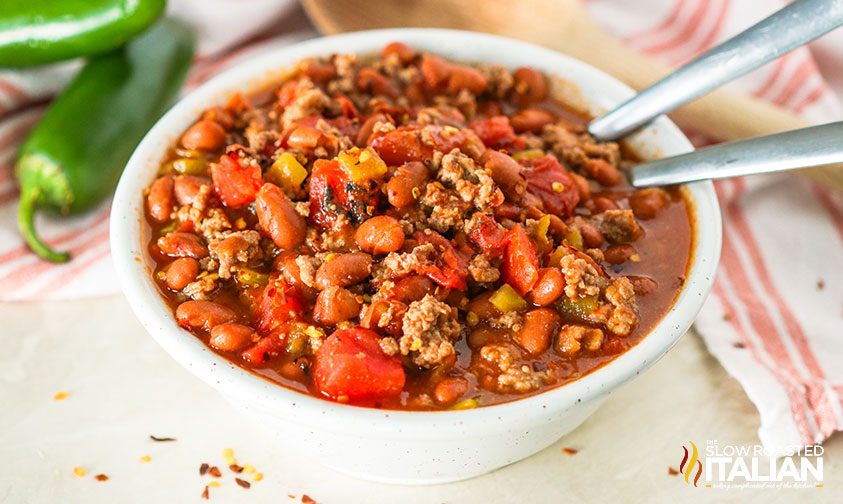 bowl of five ingredient chili with 2 spoons