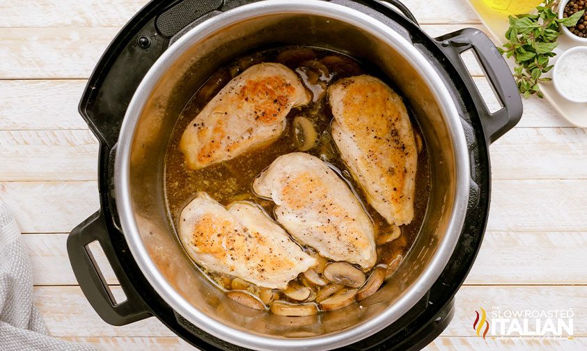 cooked chicken and mushrooms in instant pot