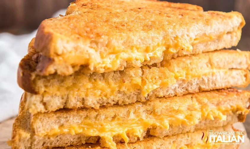 close up: stacked grilled cheese sandwich halves