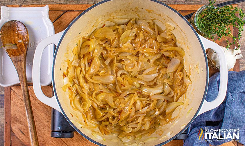buttered onion slices in large pot