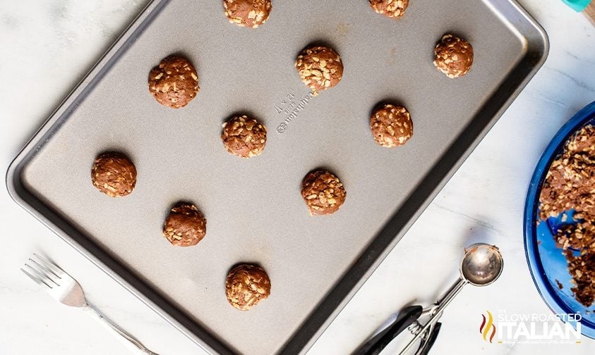 dough rounds for chocolate cake mix cookies on baking sheet