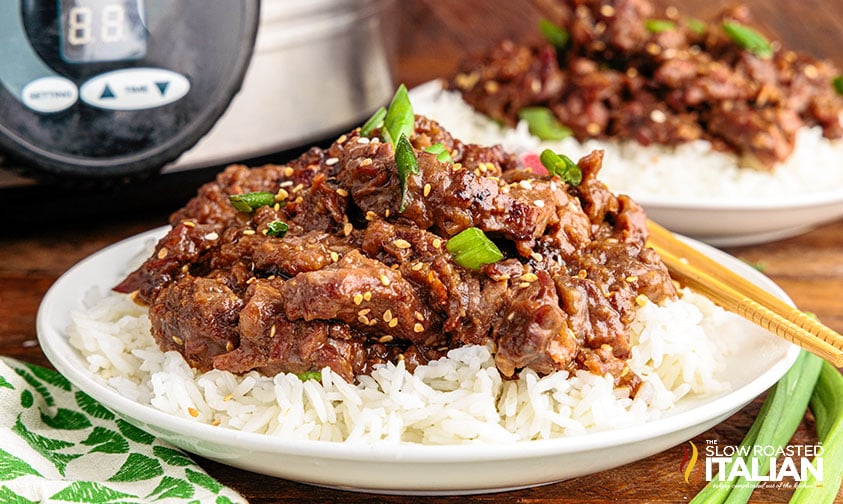 plates of mongolian beef over white rice