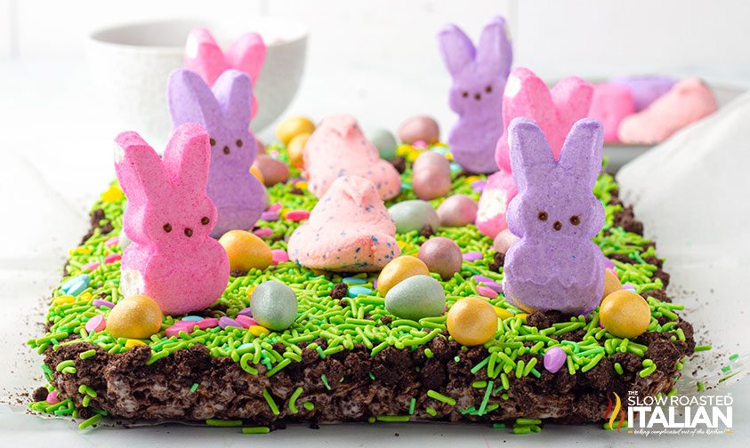 slab of easter rice krispie treats topped with chick and bunny peeps
