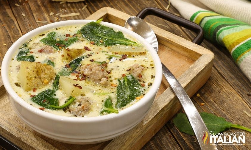 bowl of instant pot zuppa toscana with spoon on serving tray