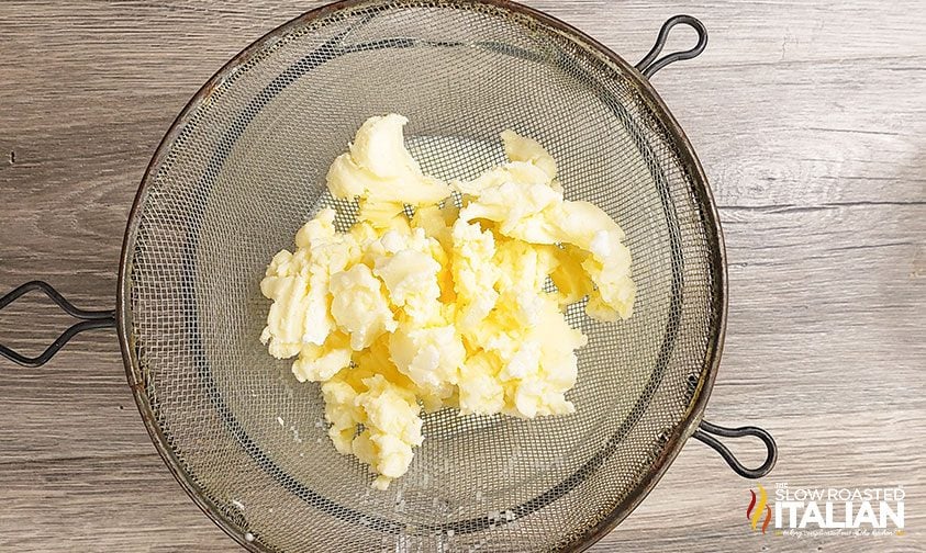 Butter in a strainer