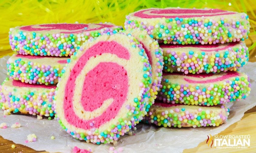 pinwheel cookies with pink swirl and pastel sprinkles